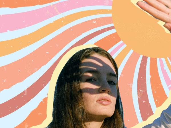 Woman holding her hand out to shield her eyes from the sun against a pink, blue and orange background